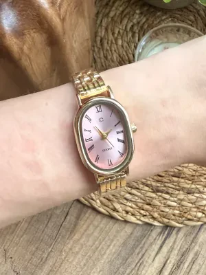 Oval Gümüş İçi Pembe Kadın Kol Saati